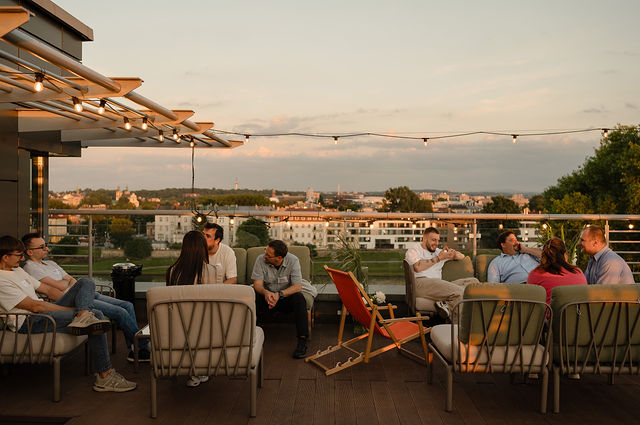 team members outside talking